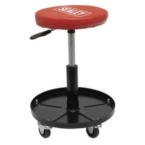 Introducing the Pneumatic Mechanic's Seat - SCR10 from Sealey, a red and black adjustable rolling stool featuring Sealey branding on the seat. This versatile workshop essential offers a swivel action seat, pneumatic height adjustment, and a round base with four wheels for easy mobility.