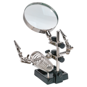 Introducing the Mini Robot Soldering Stand with Magnifier & Iron Holder - SD150H from Sealey, equipped with adjustable clips, a magnifying glass, and crocodile clamps for precision tasks in electronics and craftsmanship.