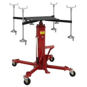 The Sealey Subframe Cradle and 500kg Transmission Jack Combo (SFC500COMBO) is a red hydraulic transmission jack equipped with foot pedal operation, caster wheels, adjustable support arms, and features a telescopic RAM for high-speed lift.
