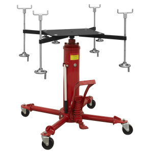 The Sealey Subframe Cradle and 500kg Transmission Jack Combo (SFC500COMBO) is a red hydraulic transmission jack equipped with foot pedal operation, caster wheels, adjustable support arms, and features a telescopic RAM for high-speed lift.