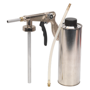 The Sealey Underbody Coating Spray Set Air Operated Deluxe Model - SG16 features a metal spray gun with a black handle, connected to a silver canister and tube. It is typically used for various cleaning, coating, or lubrication applications and incorporates an integrated air control valve to ensure precise spray settings for optimal performance.