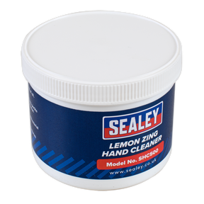 The Sealey Hand Cleaner 500ml Lemon Zing - SHC500, enriched with natural citrus extracts and solvent-free, comes in a blue and white container with a white lid.