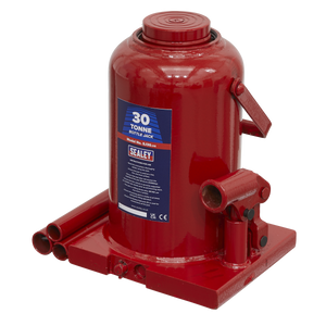 The Sealey Bottle Jack 30 Tonne - SJ30, featuring a red body with clear labeling, a sturdy carrying handle, and a well-designed base and reservoir, is perfect for lifting heavy objects.