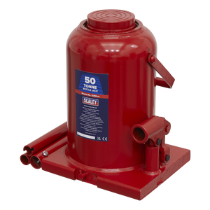 A Sealey Bottle Jack 50 Tonne - SJ50 in red, equipped with a handle for manual operation, an overload valve for safety, and a sturdy base.