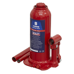 A red Sealey Bottle Jack, Model No. SJ8, with an 8-tonne capacity, includes a 2pc handle and an overload valve for safely lifting heavy objects.
