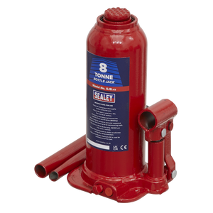 A red Sealey Bottle Jack, Model No. SJ8, with an 8-tonne capacity, includes a 2pc handle and an overload valve for safely lifting heavy objects.