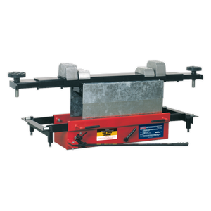 The Sealey Jacking Beam 3 Tonne with Arm Extenders & Flat Roller Supports - SJBEX300 is a heavy-duty tool featuring adjustable clamps, aluminum support blocks, and levers, designed for shaping and bending large metal sheets or pipes.