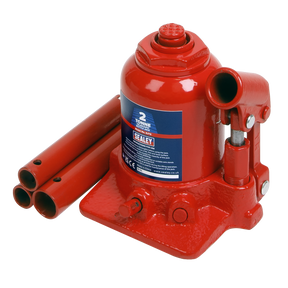 Image of a red Sealey Bottle Jack 2 Tonne Telescopic - SJT2 with dual-stage rams and a labeled capacity of 2 tonnes, alongside three cylindrical extension rods placed beside it. An overload valve ensures safety during operation.