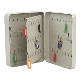 The Sealey Key Cabinet with 93 Key Tags - SKC93 features seamless steel construction and neatly labeled keys on individual hooks. The open cabinet door reveals two sections of keys organized on hooks, with enhanced corrosion resistance ensuring long-lasting durability.