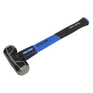 A sledgehammer with a black and blue handle labeled "Sealey," weighing 4lb (1800g), this tool boasts exceptional durability with its carbon steel head and is identified as the Sledge Hammer with Fibreglass Shaft 4lb Short Handle - SLHG04.