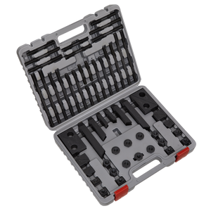 The Sealey Clamping Kit 58pc - SM25/52T comes in a gray plastic case featuring multiple compartments for organized storage of the black metal tools and accessories. The case is equipped with a handle and red latches to ensure secure closure.