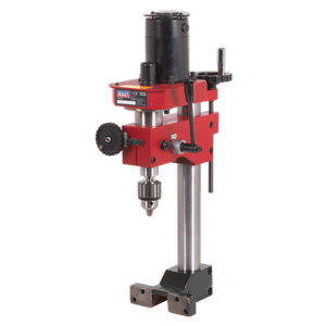 The Sealey Drill Head for Mini Lathe SM2503A - SM2503B, featuring a red and black design with a metal base, adjustable table, and chuck for holding drill bits, excels in various metalworking tasks.