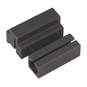 The Sealey Tool Holder (Parting & Bore) Set 2pc - SM2503THSET includes two black metal blocks with grooves and holes for screws, specifically designed for clamping or holding objects, making them ideal as tool holders for your mini lathe or drilling machine.