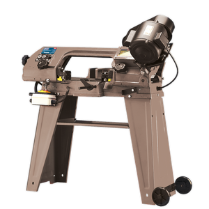 Introducing the Sealey Metal Cutting Bandsaw 3-Speed 150mm 230V - SM5: a standalone machine equipped with an oil-bath gearbox, mounted motor, control knobs, and safety guards, all supported by a heavy-duty cast base with wheels.