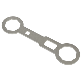 Sealey's Fork Cap Spanner 46 & 50mm - SMC46 is a metal wrench-like tool with two hexagonal openings of different sizes on each end and a rectangular opening in the middle, resembling the Showa fork cap spanner.