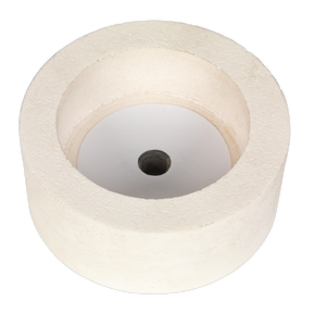 A cylindrical white object with a central hole, resembling a thick washer or spool, lies on a flat surface, much like the Dry Stone Wheel Ø125mm for SMS2107 (SMS2107GW125D) by Sealey.