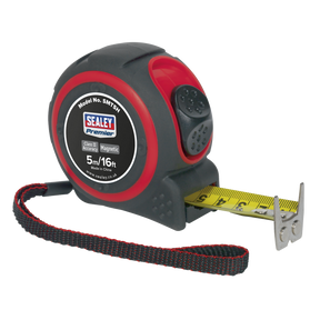 Introducing the Sealey Heavy-Duty Tape Measure 5m (16ft) - SMT5H: a highly durable black and red measuring tape from the Premier Hand Tools range, featuring a yellow metric/imperial rule tape, a magnetic tip, and an attached black wrist strap.