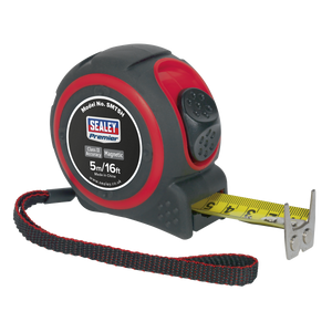 Introducing the Sealey Heavy-Duty Tape Measure 5m (16ft) - SMT5H: a highly durable black and red measuring tape from the Premier Hand Tools range, featuring a yellow metric/imperial rule tape, a magnetic tip, and an attached black wrist strap.