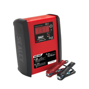 A Sealey Schumacher® Intelligent Speed Charge Battery Charger/Maintainer (12V 15A/24V 10A - SPI1224S) in red and black, equipped with a digital display, featuring reverse polarity protection and paired with two jumper cables (red and black).