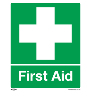 The Sealey Safety Sign - First Aid, featuring a white cross symbol above the text "First Aid" on a green background, is crafted from durable rigid plastic and ideal for commercial or office use.