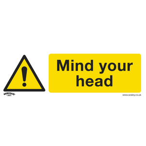 The Sealey Warning Safety Sign - Mind Your Head (SS39P10) is a yellow and black sign with an exclamation mark and the text "Mind your head," ideal for office and commercial environments, made from rigid plastic and available in a pack of 10.