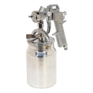 The Sealey Spray Gun Suction Feed - 1.5mm Set-Up (SSG401) features a metallic design, an attached cylindrical container, and adjustable paint flow.