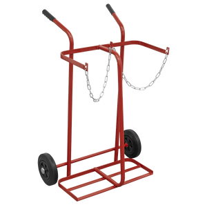 The Sealey Welding Bottle Trolley - 2 Bottle - ST28/B is a red metal cylinder cart featuring large wheels, a supporting platform, two handles, and a securing chain, designed specifically for transporting heavy cylinders. Its lightweight tubular steel frame ensures ease of movement.