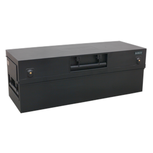 The Sealey Truck Box 1275 x 470 x 450mm - STB07 is a black rectangular heavy-duty storage box featuring a central handle, two side latches, and a nameplate on the top, making it ideal for secure tool storage.