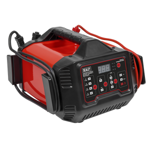 The Sealey 6/12V 150A Starter/15A Automatic Battery Charger & Maintainer - SUPERBOOST150D is a red and black device with a digital display and multiple controls, prominently displaying the brand name "Sealey" and model details on the front panel. It comes with attached cables and clamps, and includes a fast charge program for quick charging needs.