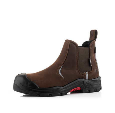 The Buckler - Nubuckz Safety Dealer Boot - Nkz101Br by Buckler is a brown leather pull-on work boot featuring a composite toe cap, slip-resistant black outsole, and elastic side panels.