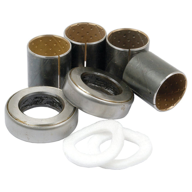 Various mechanical bushings and gaskets, including the Sparex Spindle Repair Kit (Part No. S.40217) for Massey Ferguson, displayed against a white background.