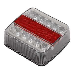 The Sealey Lighting Cluster Rear Square SMD LED 12V - TB18LED is a modern direct replacement tail light, featuring a red reflective strip in the middle and a clear, segmented outer casing. It's E-Mark approved and includes 5-Function SMD LEDs for versatile performance.