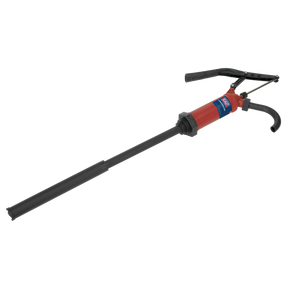 The Sealey Lever Action Pump - TP6803, designed for 205L drums, features a durable polypropylene construction with a long black hose and red body. It has a handle for easy operation and delivers 300ml per stroke.