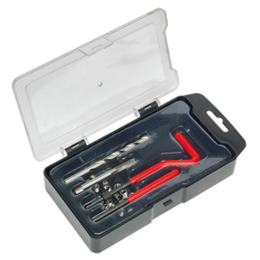 The Sealey Thread Repair Kit M6 x 1mm - TRM6 features a plastic case with a transparent lid, containing various drill bits and red-handled tools organized in designated slots, making it perfect for repairing damaged threads and ensuring a stronger internal thread.