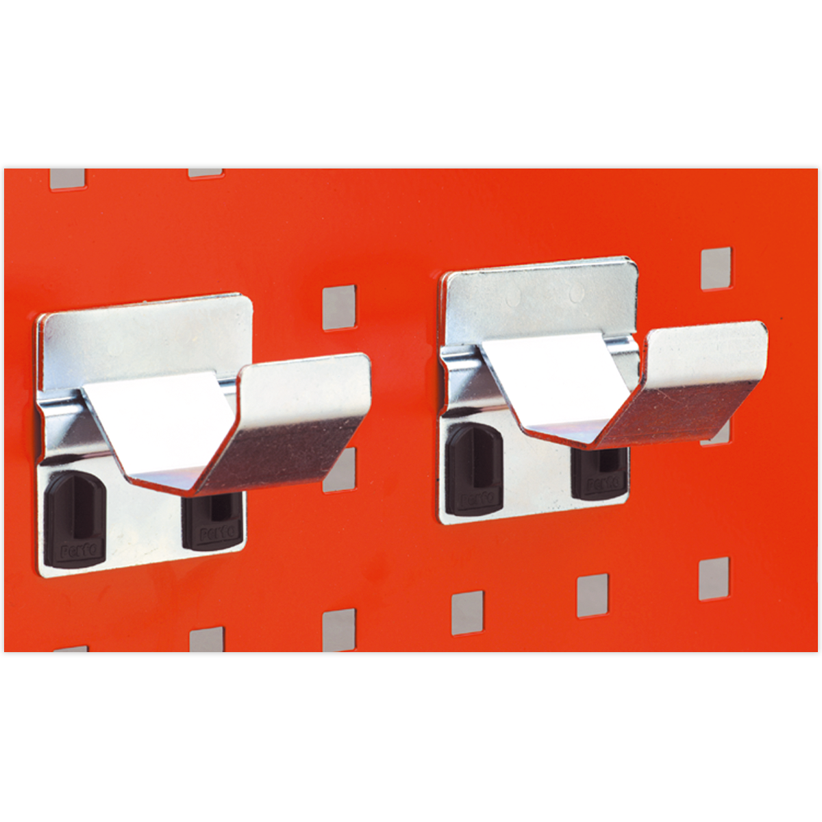 Two Sealey Pipe Brackets Ø60mm from the TTS24 pack of two are mounted on an orange PerfoWall panel, each holding a black plastic accessory behind the bracket.