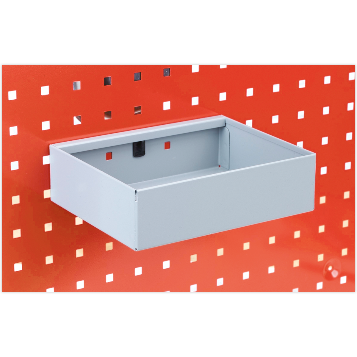 A Storage Tray for PerfoTool/Wall Panels 225 x 175 x 65mm - TTS40 by Sealey is attached to a red perforated PerfoWall panel.