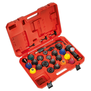 The Sealey Cooling System Pressure Test Kit 25pc - VS0011, featuring a red, open carrying case with assorted radiator pressure tester adapters in various colors and sizes, comes complete with a pressure gauge tool and additional accessories. This kit is perfect for vehicle applications and ensures accurate adaptor fitments.