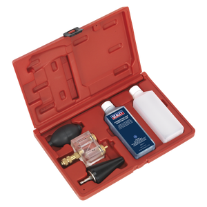 Sealey's Combustion Leak Detector (VS0062) comes in a red plastic carrying case and includes essential tools for maintaining cylinder heads, such as a clear fluid reservoir, pump, black nozzle, and two bottles--one with a blue label and another with a white label.