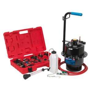 A Sealey Pneumatic Brake & Clutch Pressure Bleeder Kit - VS0204, featuring a red plastic case with various tools, is open next to a black hydraulic pump equipped with a gauge, handle, and red hose. Nearby, a white bottle and additional accessories are neatly arranged. This one-person brake bleeding system is ABS compatible.