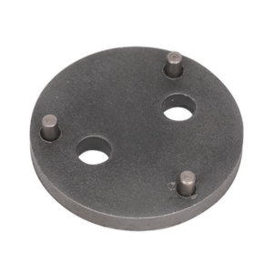 Sealey's Rear Brake Piston Wind-Back Adaptor - VAG - VS02821 is a circular metal plate with four protruding pins and two holes, designed specifically as an adaptor for rear brake calipers on VAG vehicles.