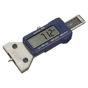 The Sealey Digital Tyre Tread Depth Gauge - Pin Tip (VS0565) displays a reading of 71.12 mm on its LCD screen. The blue gauge is equipped with a stainless steel measuring jaw and has several buttons, including "ON," "ZERO," and "HOLD." It provides both metric and imperial calibration for versatile use.