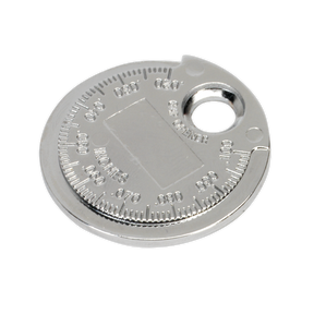 The Sealey Spark Plug Gapper Circular Ramp Type 0.6-2.4mm (0.020" to 0.100") - VS119 features numerical markings in both Imperial and Metric measurements, a central rectangular groove, and a round hole near its edge; ideal for mechanics to effortlessly adjust spark plug gaps.