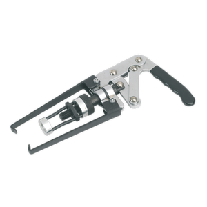 The Sealey Valve Spring Compressor OHV - VS160 is a metal mechanical tool with a handle and adjustable components, designed for use in pulling or extracting during valve spring replacement.