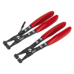 Two Sealey Hose Clip Pliers from the VS1665 set with PVC dipped red handles are laid out next to each other, featuring angled and straight tips, showcasing their heavy-duty construction.