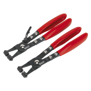 Two Sealey Hose Clip Pliers from the VS1665 set with PVC dipped red handles are laid out next to each other, featuring angled and straight tips, showcasing their heavy-duty construction.