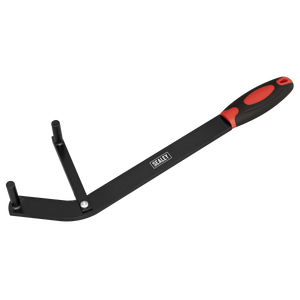 The Sealey Camshaft Positioning Tool - VS173 is a black and red hand tool featuring a long handle with two prongs at the end, designed for gripping objects. It is adjustable to fit most engines.