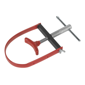 The Sealey Motorcycle Pulley Holder Ø45-120mm - VS1811 in red and silver features an adjustable screw mechanism, making it perfect for tightening or holding objects in place during motorcycle maintenance or clutch pulley adjustments.