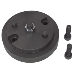 The Sealey Crankshaft Sensor Trigger Wheel Installer (VS231) for Jaguar and Land Rover is a black metal tool with a round base and central bolt, reminiscent of a crankshaft trigger wheel, accompanied by two separate bolts.