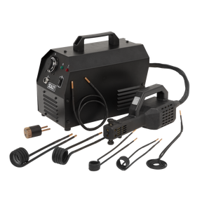 The Sealey Induction Heater - Rapid Heat 2300W (VS250), known for its fast heat delivery, comes with various attachments and coils. It includes a control unit, handheld heating device, and multiple coil wires, making it perfect for loosening stubborn fixings. All items are placed on a clean white background.