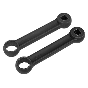 The Sealey Mercedes Benz Engine Mount Spanner 16 & 17mm 2pc - VS3005 includes two black ratcheting box-end wrenches, each equipped with square drive sockets at one end and circular, toothed ring spanners marked 16mm and 17mm. These tools are perfect for tasks such as loosening engine mount bolts on Mercedes Benz vehicles.